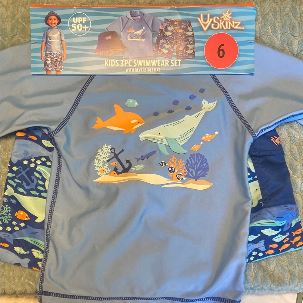 Skin Blue Rashguard Swim Shirt with Playful Design